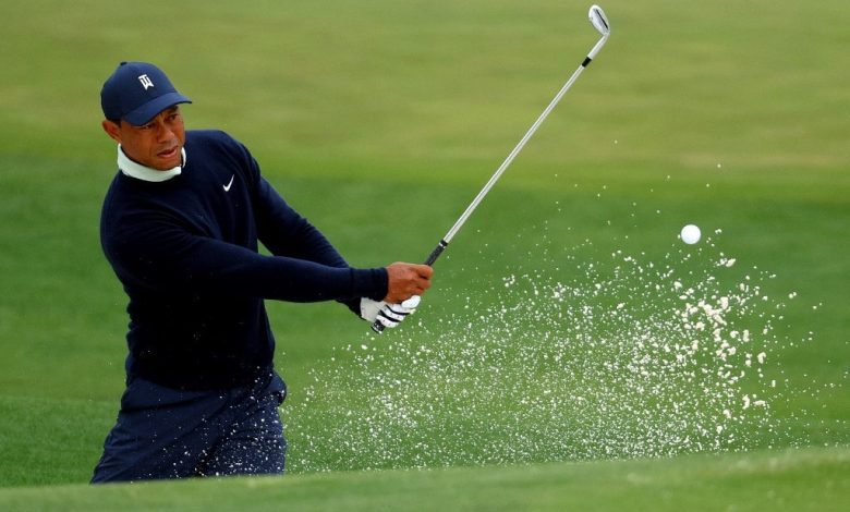 Tiger Woods of the United States warms up on the range during a practice round prior to the Masters at Augusta National Golf Club