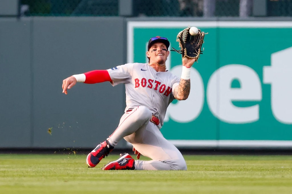 Centerfielder Jarren Duran #16 of the Boston Red Sox catches a fly ball during the first inning against the Colorado Rockies at Coors Field on July 22, 2024 in Denver, Colorado
