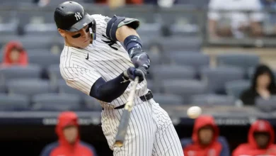 Aaron Judge #99 of the New York Yankees connects on his fourth inning RBI single against the Los Angeles Angels during game one of a doubleheader at Yankee Stadium on August 07, 2024 in New York City