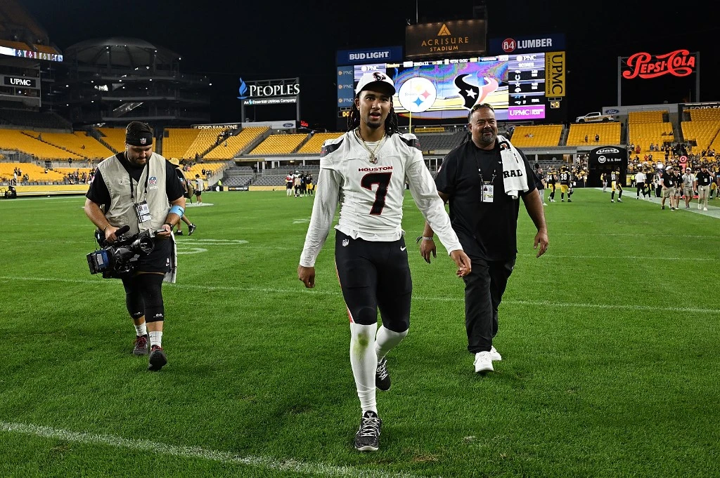 C.J. Stroud #7 of the Houston Texans walks off the field after a 20-12 win over the Pittsburgh Steelers during the preseason game at Acrisure Stadium on August 9, 2024 in Pittsburgh, Pennsylvania.